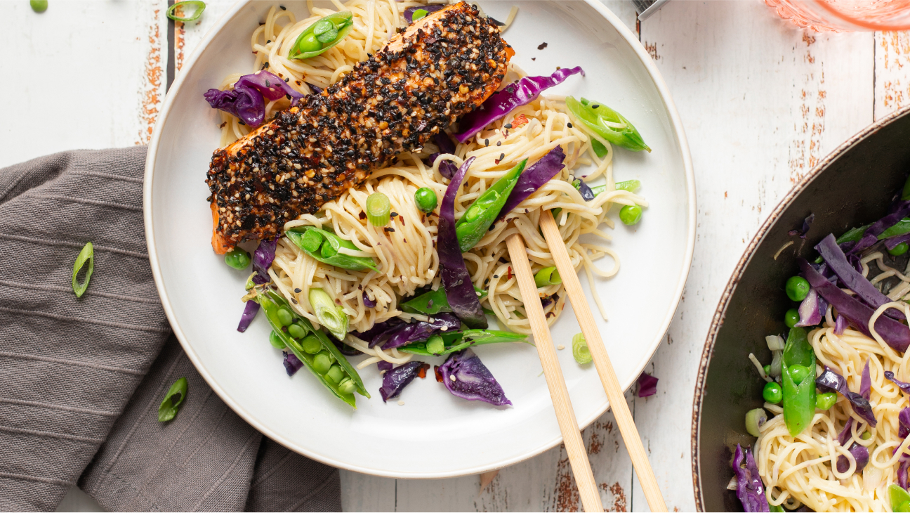 Noodle and Seaweed dish on a plate with chop sticks